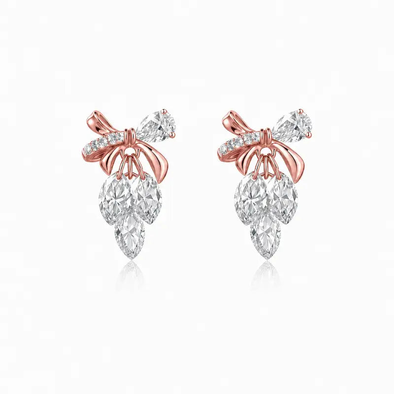 18K Solid Gold Bow & Plume Floating Lab Diamond Stud Earring by LTM & CO.™, featuring a shiny sculptural design with floating diamond detail for modern fine jewelry styling.