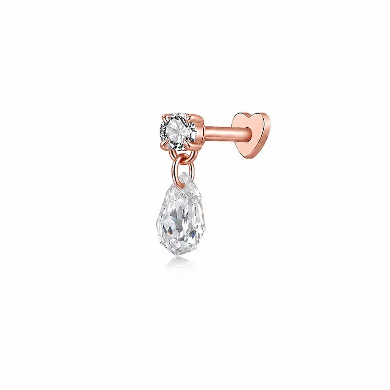 A high-resolution photo of the Step Cut Pear Round Threaded Dangle Stud from LTM & CO.™. Features a brilliant round diamond connected to a hanging step-cut pear diamond in 18K solid gold (AU750). The image highlights the "hall-of-mirrors" effect of the step-cut gemstone and the crystalline VVS-VS clarity of the D-E color diamonds, showcasing the geometric precision of the Architectural Rhythm collection.