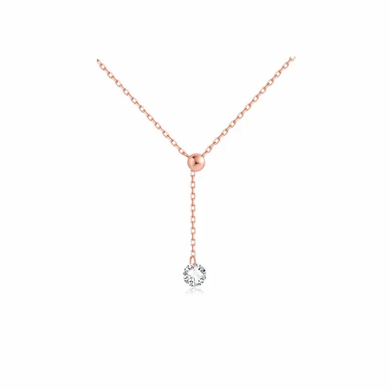 A high-resolution product studio photograph of the Adjustable Round Diamond Necklace from the LTM Jewels Radiant Drift collection. Handcrafted in 18K solid gold, the necklace features a 0.2ct round brilliant lab-grown diamond of VVS-VS clarity and D-E color. The image highlights the delicate fine-link chain and the innovative sliding silicone bead mechanism that allows for adjustable diamond placement and length. The high-polish AU750 gold finish is displayed against a professional clean background.