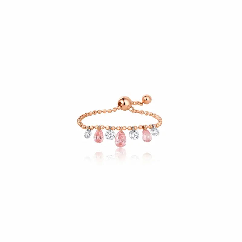 LTM & CO. Seven Drilled Pink & White Diamond Beaded Ring from the Radiant Drift collection. Features seven floating lab-grown diamonds (pink and white) laser-drilled onto a textured 18K solid gold beaded band. A rhythmic, architectural design featuring setting-free diamonds for maximum sparkle and modern, sustainable elegance.