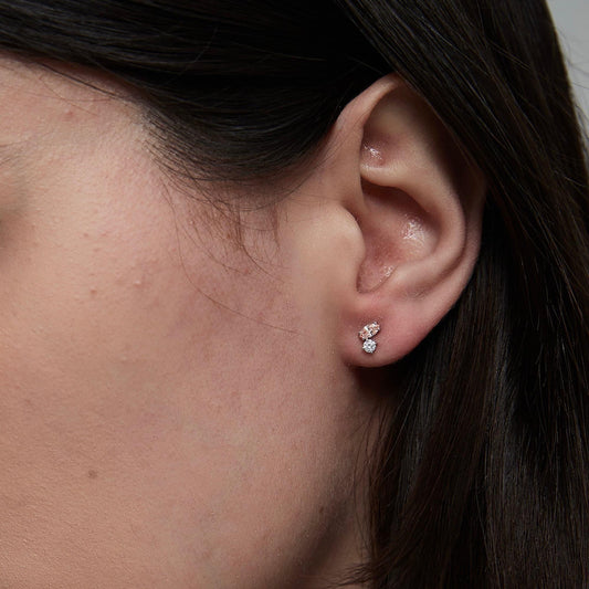 Detail of the 0.1ct pink marquise and 0.06ct white lab diamond in 18K gold.