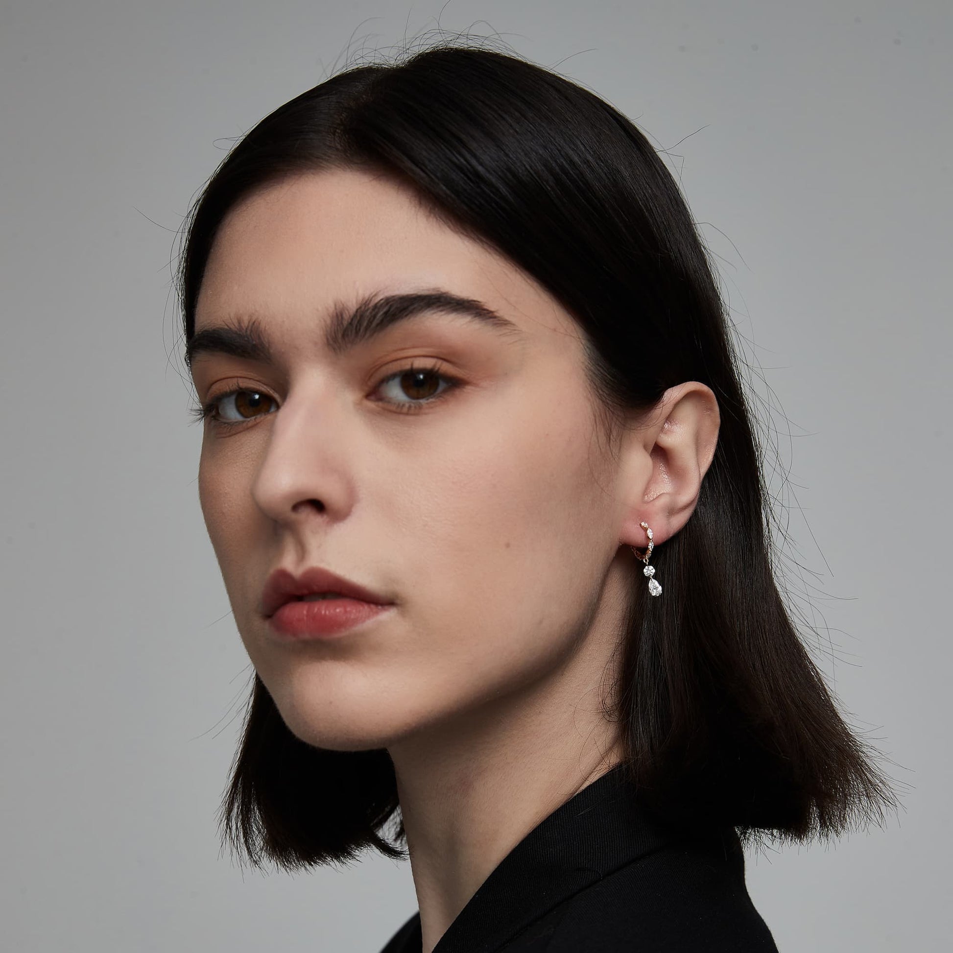 Comparison of the 5-stone and 7-stone marquise diamond dangle hoop variations