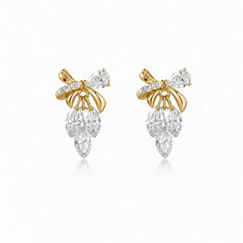 18K Solid Gold Bow & Plume Floating Lab Diamond Stud Earring by LTM & CO.™, featuring a shiny sculptural design with floating diamond detail for modern fine jewelry styling.