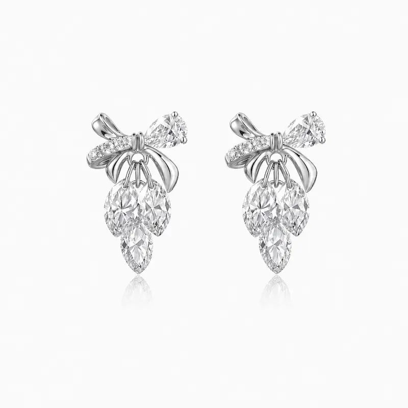 18K Solid Gold Bow & Plume Floating Lab Diamond Stud Earring by LTM & CO.™, featuring a shiny sculptural design with floating diamond detail for modern fine jewelry styling.