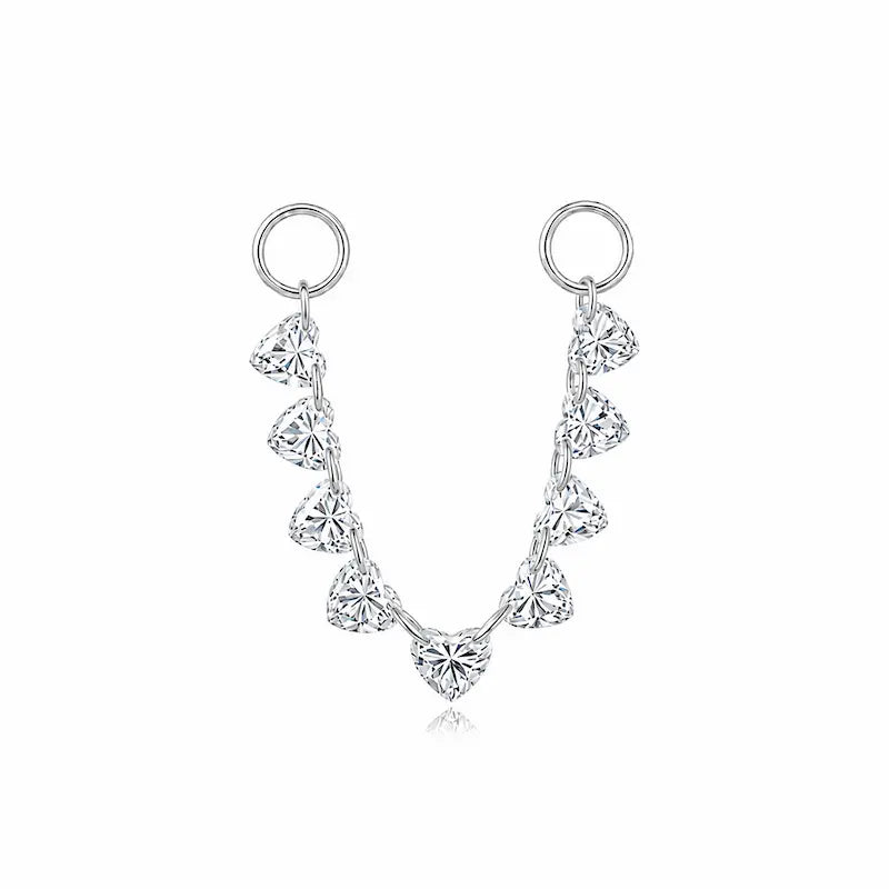 18K solid gold floating heart diamond connecting charm featuring a suspended heart-cut lab-grown diamond in LTM Jewels’ signature Celestial Drift design. The minimalist laser-drilled floating construction creates a luminous weightless appearance designed for modern curated ear styling and everyday luxury wear.