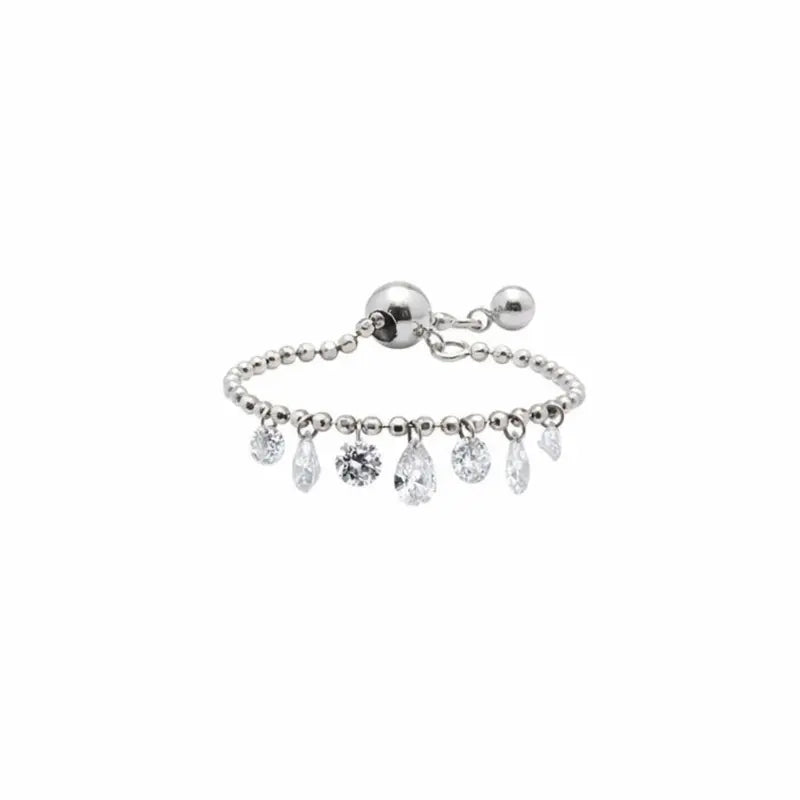 LTM & CO. Seven Drilled Pink & White Diamond Beaded Ring from the Radiant Drift collection. Features seven floating lab-grown diamonds (pink and white) laser-drilled onto a textured 18K solid gold beaded band. A rhythmic, architectural design featuring setting-free diamonds for maximum sparkle and modern, sustainable elegance.