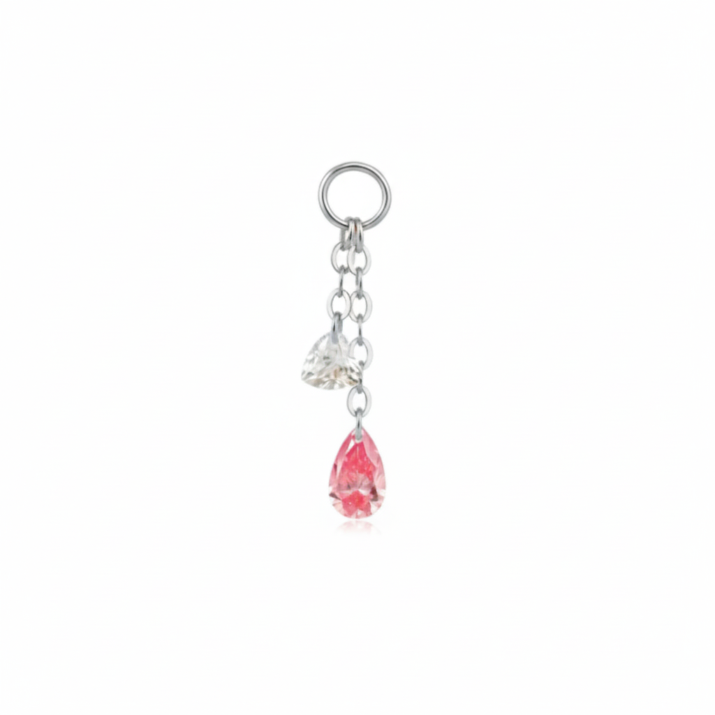 Gold keychain with a teardrop-shaped pink gem and clear gem on a white background in white diamond