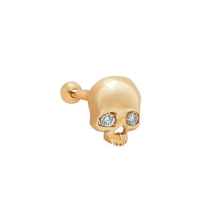 Gold earring with small diamonds on a white background