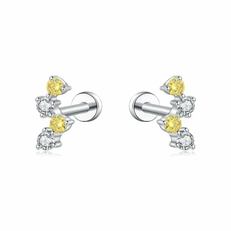 A high-resolution studio photo of the Double Yellow Double White Threaded Stud by LTM & CO.™. Features a minimalist arrangement of two yellow and two white diamonds totaling 0.08ctw in handcrafted 18K solid gold (AU750). The image captures the warm brilliance of the yellow stones and the crystalline D-E fire of the white diamonds, highlighting the VVS-VS clarity and the premium professional piercing engineering of the Solar Radiance collection.