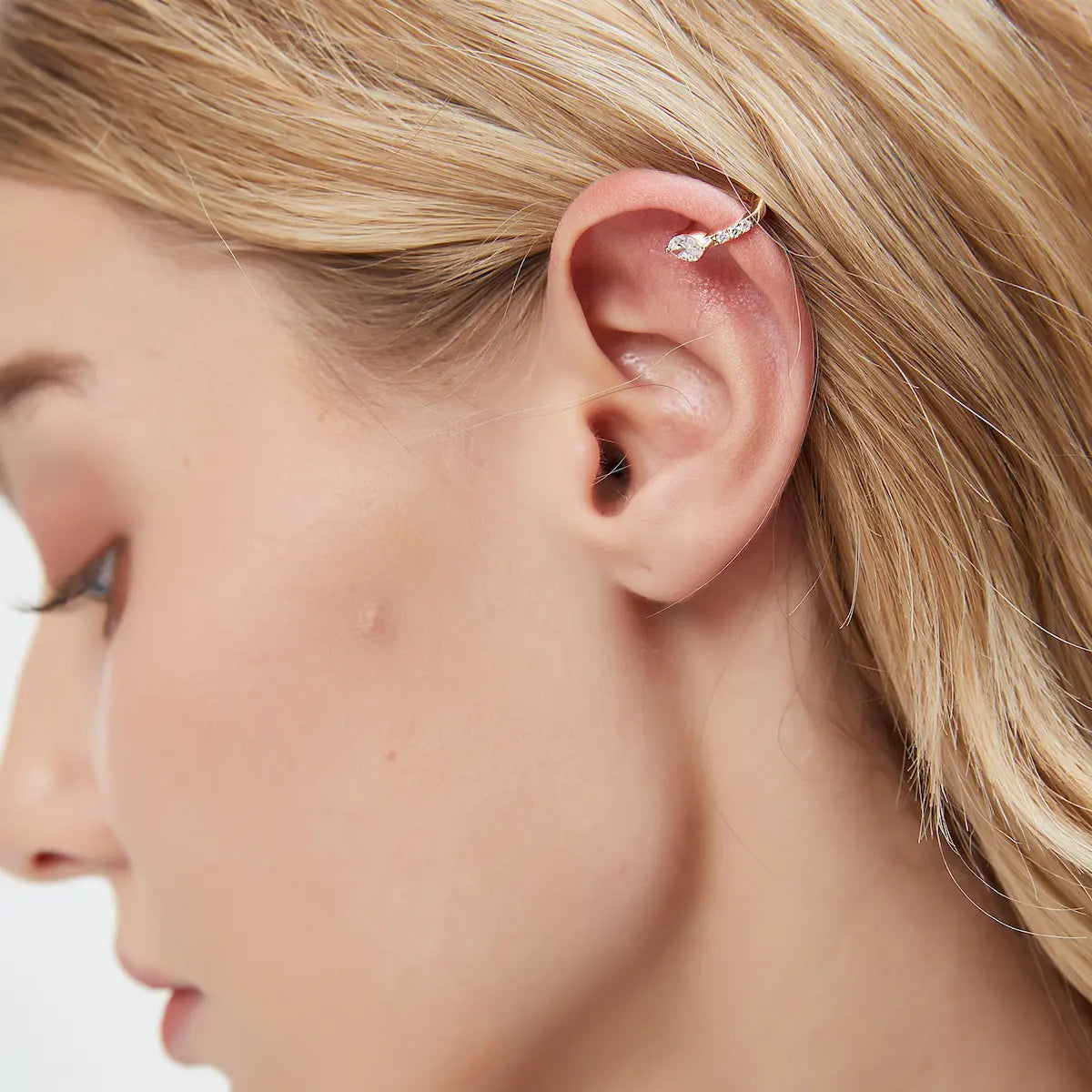 Close-up of Marquise Pavé Lab Diamond Hoop Earring in 18K solid gold, highlighting precision pavé setting and brilliant lab-grown diamonds with clean architectural edges.
