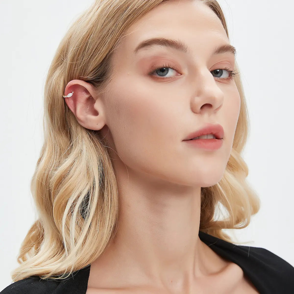Marquise Pavé Lab Diamond Hoop Earring worn on ear, showcasing 18K solid gold structure and pavé lab-grown diamonds, creating a refined geometric look for everyday luxury styling.