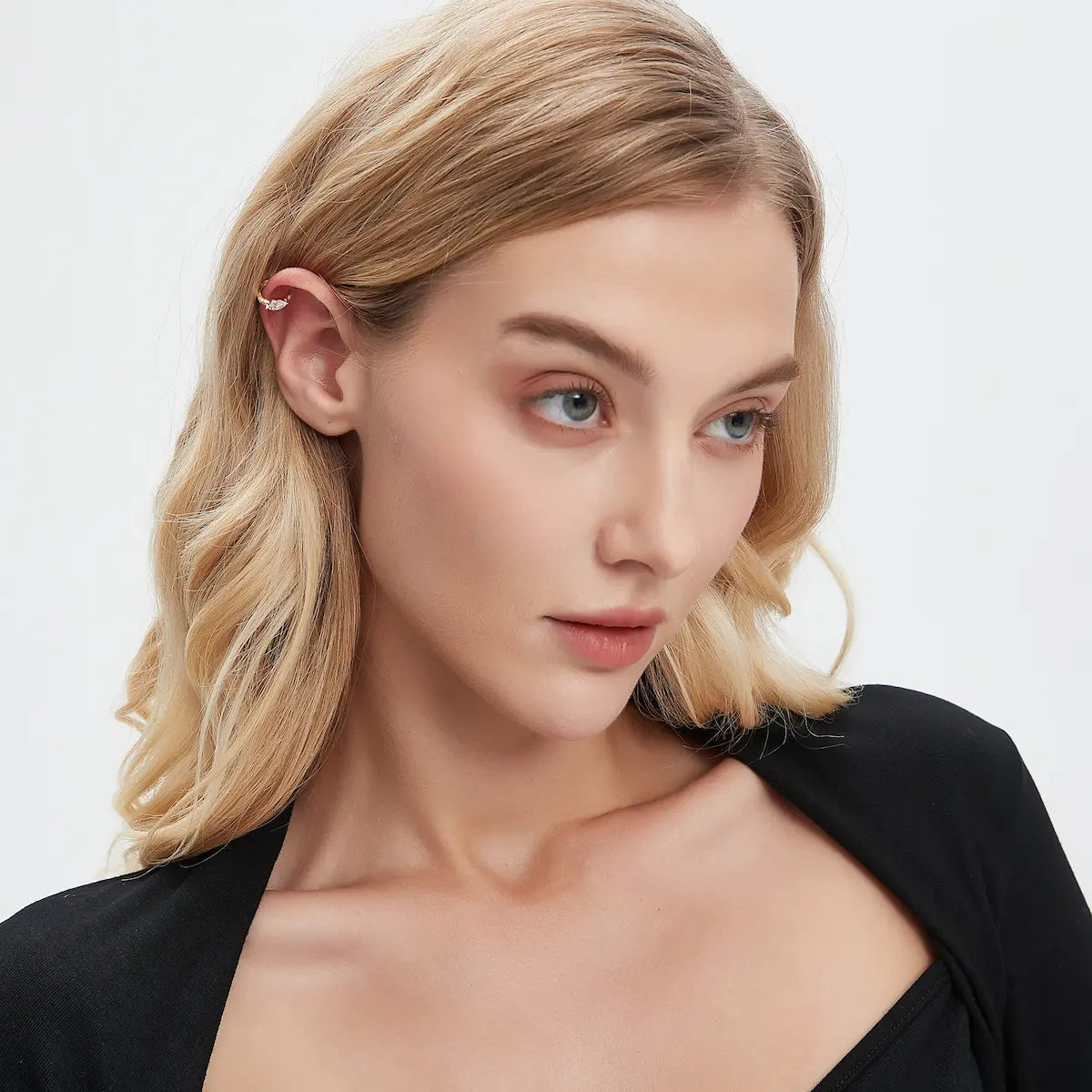 Model wearing Marquise Pavé Lab Diamond Hoop Earrings in 18K solid gold by LTM & CO.™, styled as modern fine jewelry with a bold yet minimal geometric silhouette.