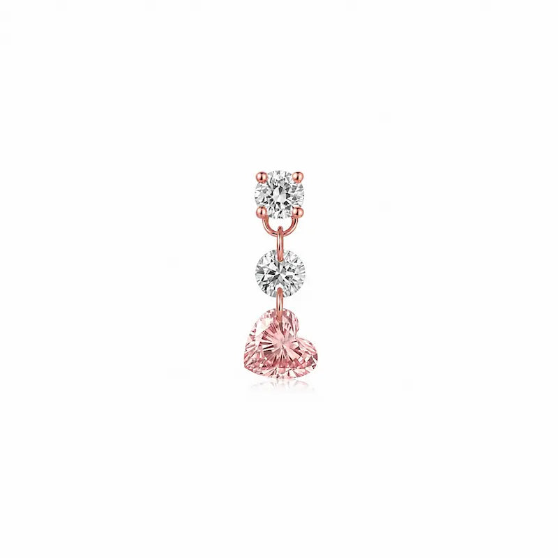 8K solid gold Pink Heart Floating Diamond Stud featuring a suspended 0.20ct lab-grown pink heart-shaped diamond accented by two floating white round diamonds. The weightless floating design maximizes brilliance while creating a romantic modern silhouette inspired by contemporary fine jewelry and eternal elegance.