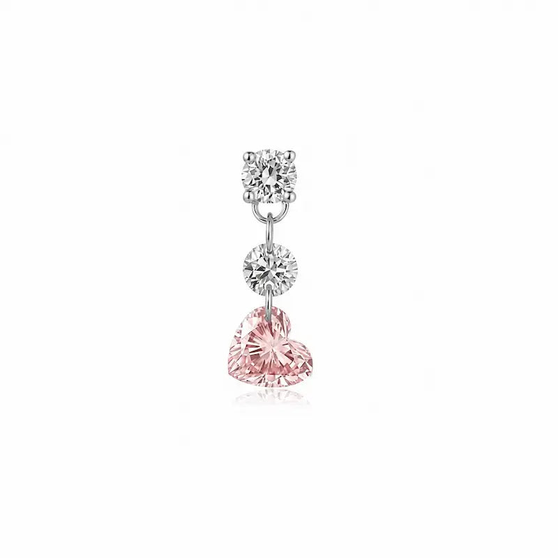 8K solid gold Pink Heart Floating Diamond Stud featuring a suspended 0.20ct lab-grown pink heart-shaped diamond accented by two floating white round diamonds. The weightless floating design maximizes brilliance while creating a romantic modern silhouette inspired by contemporary fine jewelry and eternal elegance.
