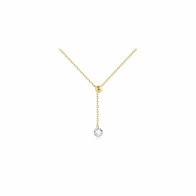 A high-resolution product studio photograph of the Adjustable Round Diamond Necklace from the LTM Jewels Radiant Drift collection. Handcrafted in 18K solid gold, the necklace features a 0.2ct round brilliant lab-grown diamond of VVS-VS clarity and D-E color. The image highlights the delicate fine-link chain and the innovative sliding silicone bead mechanism that allows for adjustable diamond placement and length. The high-polish AU750 gold finish is displayed against a professional clean background.