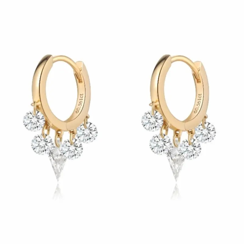 A high-fashion 18K solid gold fringe hoop earring from LTM Jewels, featuring a stunning symmetrical arrangement of five lab-grown diamonds. The design is centered by a modernist laser-drilled kite-cut diamond, flanked by two pairs of brilliant round diamonds that create a rhythmic fringe effect. This 0.55ctw piece from the Celestial Drift collection showcases VVS-VS clarity and D-E color diamonds with a setting-free, floating aesthetic. 