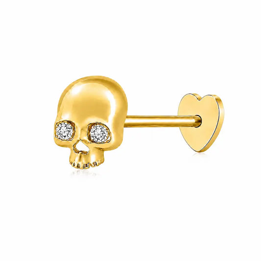 Memento-Mori-Main	A professional high-resolution studio photograph of the Diamond Skull Threaded Stud from the LTM Jewels Memento Mori collection. This 18K solid gold stud is meticulously sculpted with anatomical skull details and accented by a 0.02ct natural round brilliant diamond of VS1 clarity and E color. The image showcases the high-polish AU750 gold finish and the secure threaded screw back design against a clean background, highlighting the blend of rebellion and refinement.