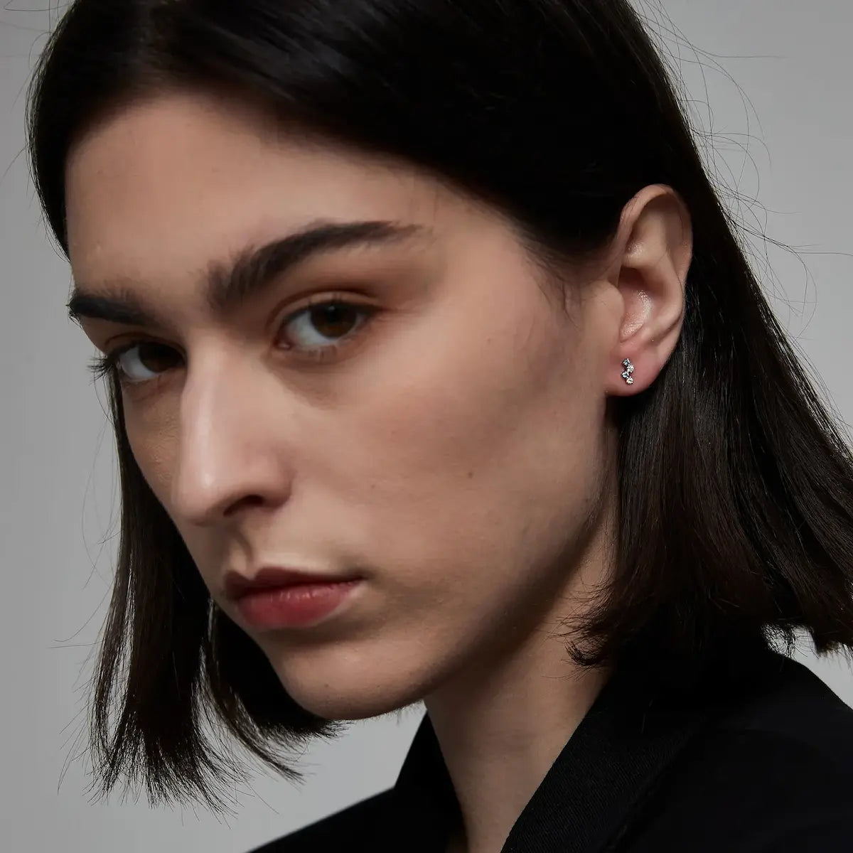 Side view of Round Floating Blue & White Lab Diamond Threaded Stud Earring in 18K solid gold, showing floating diamond structure and threaded screw-back design.