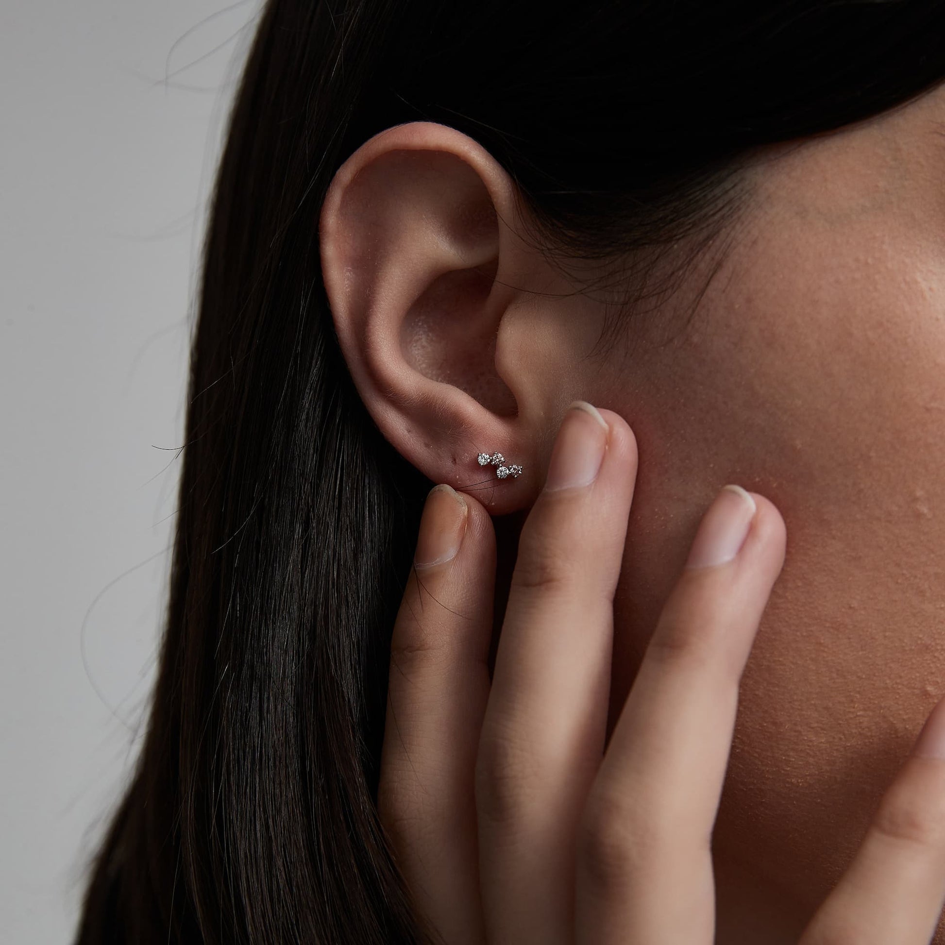 Close-up of the 18K gold internally threaded flat back post for 24/7 comfort