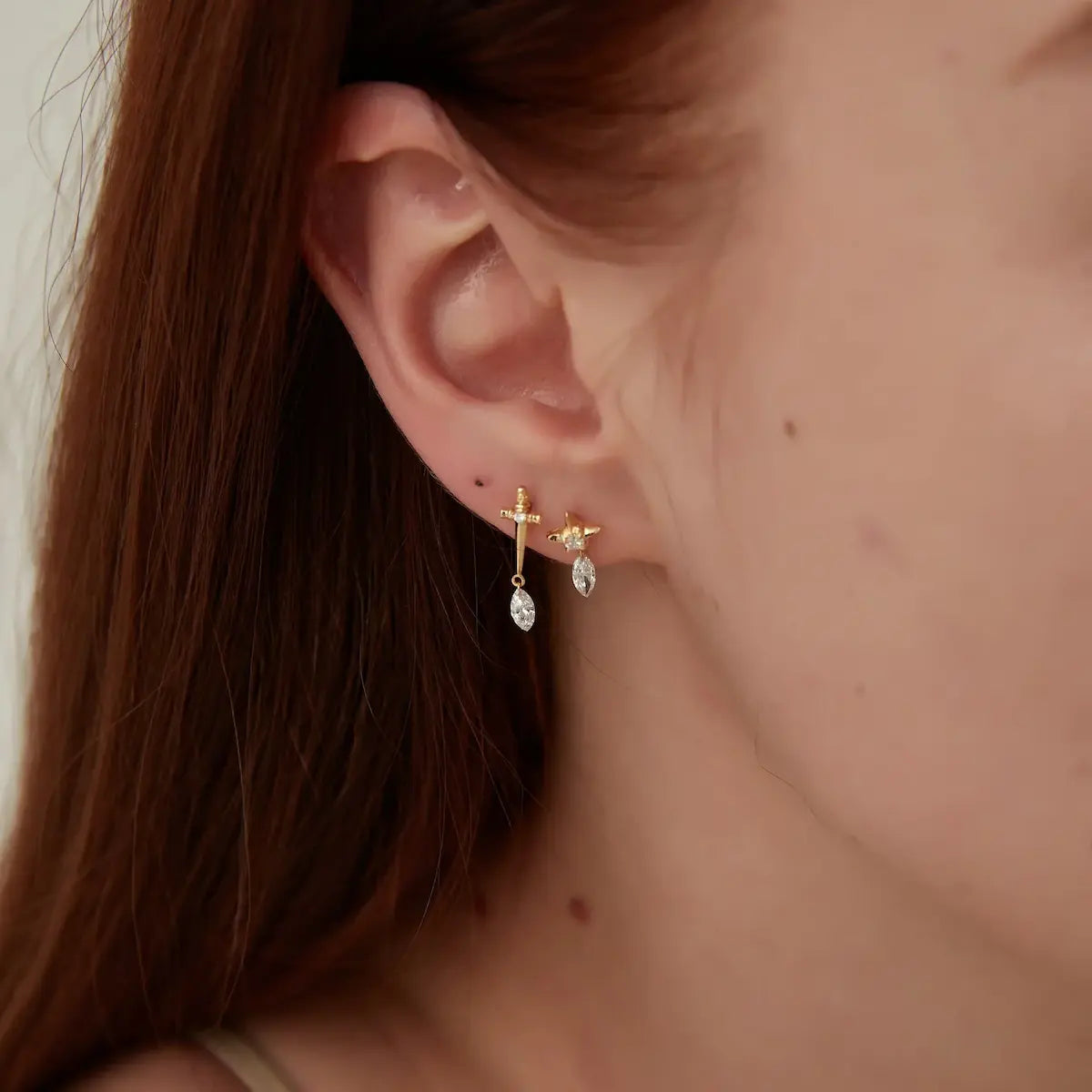 Side view of Sword Marquise Dangle Threaded Stud in 18K gold, showing dangle structure and screw-back design.
