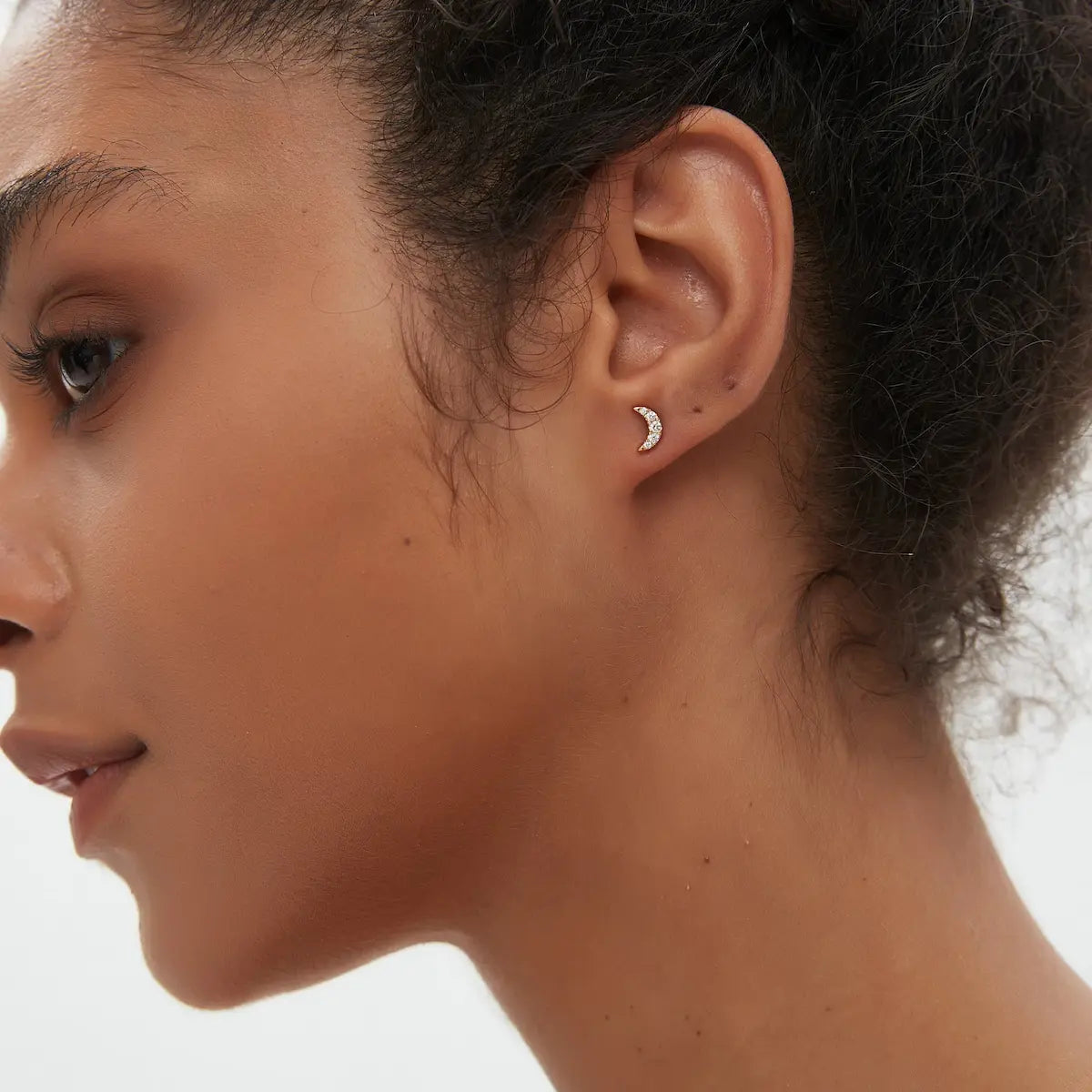 Side view of the Diamond Crescent Moon Stud crafted in solid 18K gold showcasing the secure threaded screw-back structure and sculptural crescent moon silhouette. The lightweight minimalist design is engineered for comfortable 24/7 wear and refined contemporary styling.