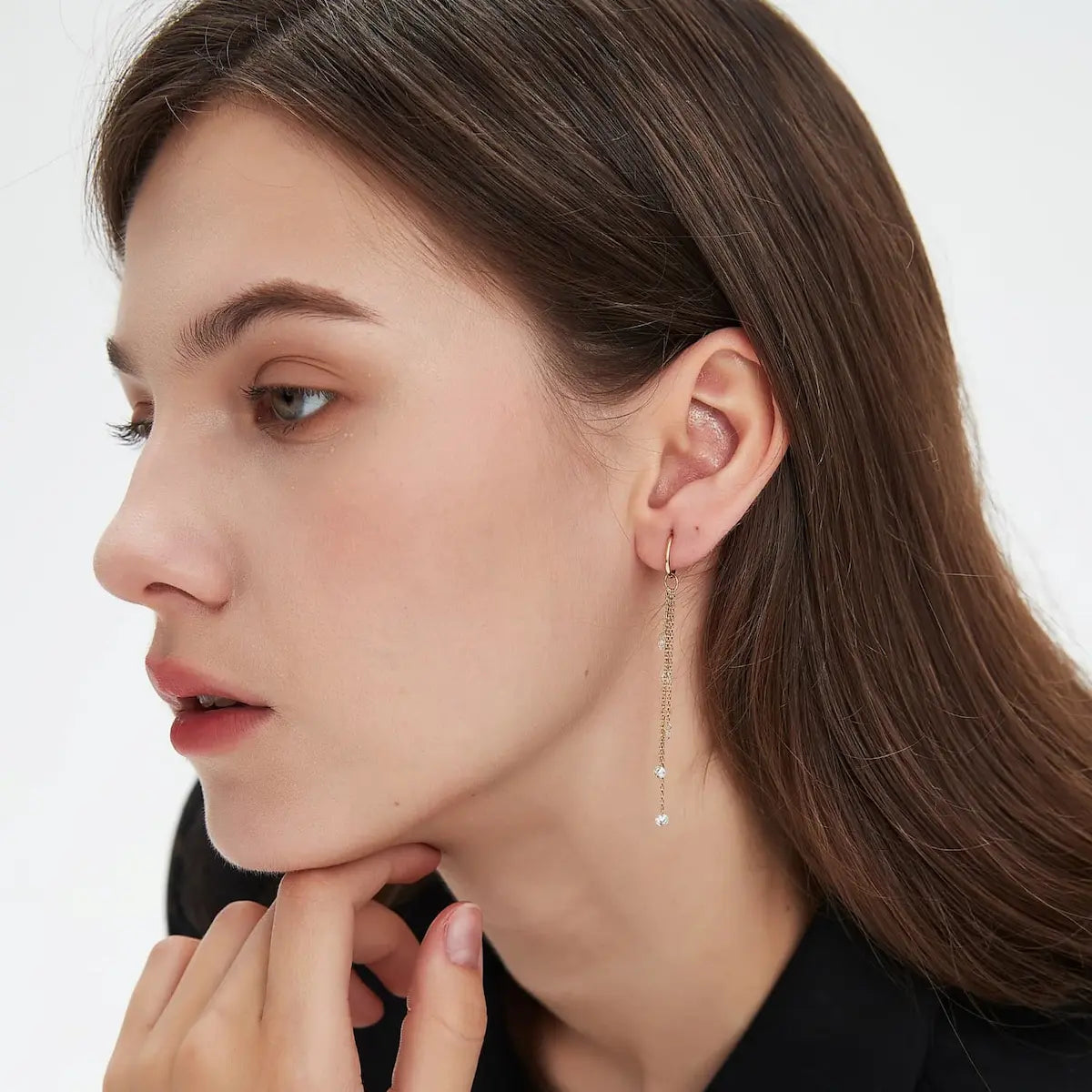 A technical side profile view of the Marquise Linear Waterfall Charm. This image highlights the structural integrity of the 18K solid gold AU750 jump ring and the secure laser-drilled connection between the five marquise diamonds. The side perspective showcases the slim and comfortable profile of the charm, ensuring it sits perfectly on any hoop or stud. The consistent high-polish finish and the alignment of the diamonds are clearly visible, demonstrating the technical quality of the piece.