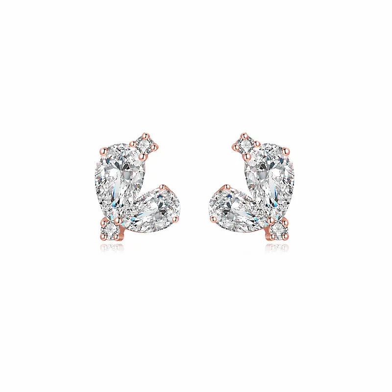 A high-resolution studio photograph of the Pear Diamond Threaded Stud from the LTM Jewels Eternal Heart collection. This 18K solid gold stud features two premium pear-cut lab-grown diamonds of VVS-VS clarity and D-E color, meticulously paired to create a modern heart silhouette. The image highlights the high-polish AU750 gold finish and the secure professional threaded screw back design against a clean background, showcasing its status as a timeless and cinematic heirloom for all genders.