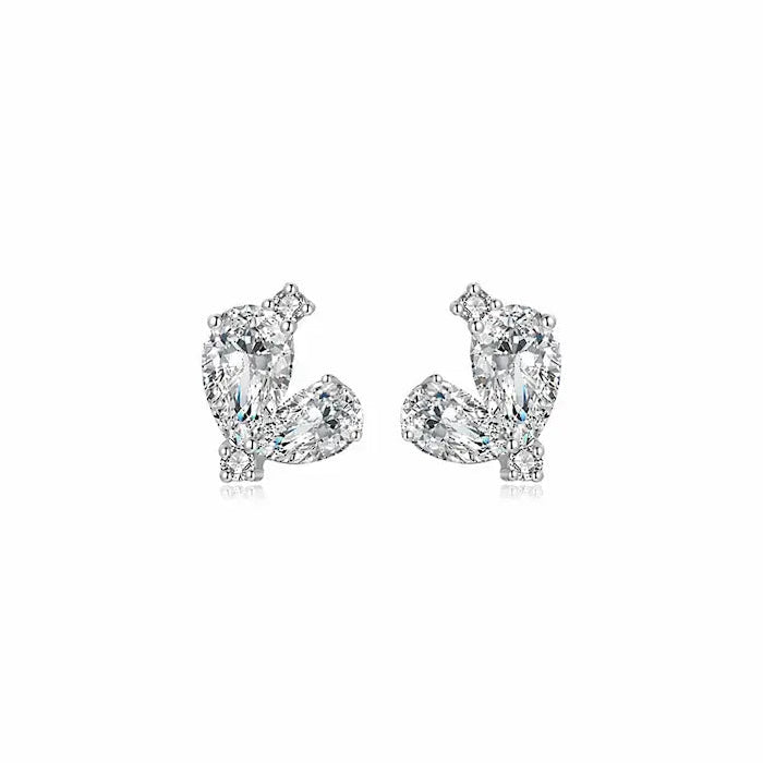 A high-resolution studio photograph of the Pear Diamond Threaded Stud from the LTM Jewels Eternal Heart collection. This 18K solid gold stud features two premium pear-cut lab-grown diamonds of VVS-VS clarity and D-E color, meticulously paired to create a modern heart silhouette. The image highlights the high-polish AU750 gold finish and the secure professional threaded screw back design against a clean background, showcasing its status as a timeless and cinematic heirloom for all genders.