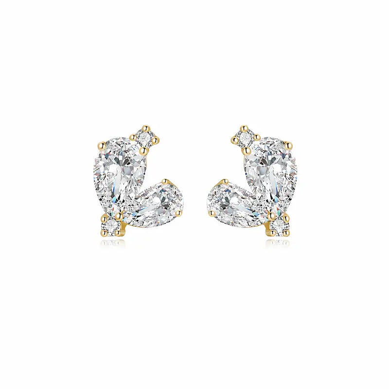 A high-resolution studio photograph of the Pear Diamond Threaded Stud from the LTM Jewels Eternal Heart collection. This 18K solid gold stud features two premium pear-cut lab-grown diamonds of VVS-VS clarity and D-E color, meticulously paired to create a modern heart silhouette. The image highlights the high-polish AU750 gold finish and the secure professional threaded screw back design against a clean background, showcasing its status as a timeless and cinematic heirloom for all genders.