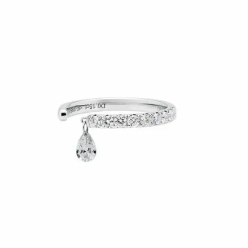 Pear diamond ring handcrafted in 18K solid gold featuring a 0.15ct lab grown pear-cut diamond suspended in a floating drop design. Pavé-set lab diamonds along half the band add continuous sparkle. Modern luxury fine jewelry designed by LTM Jewels for elegant everyday wear and timeless sophistication.
