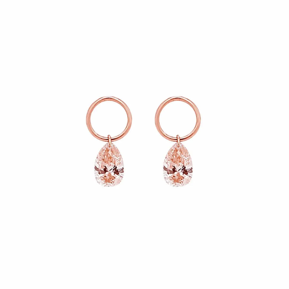 A high-resolution studio photograph of the Pear Pink Diamond Earring Charm from the LTM Jewels Blush Symphony collection. Handcrafted in 18K solid gold, the charm features a fancy light pink pear-cut lab-grown diamond in a minimalist laser-drilled setting. The image highlights the high-polish AU750 gold jump ring and the weightless floating effect of the diamond against a clean background, showcasing its status as a romantic cinematic heirloom with VVS-VS clarity.