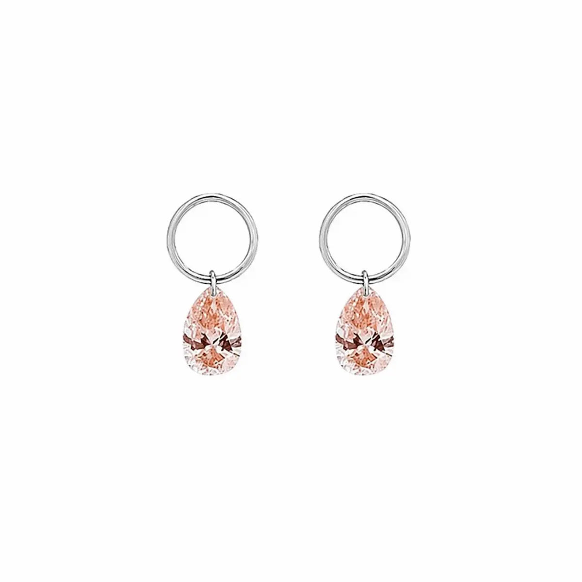 A high-resolution studio photograph of the Pear Pink Diamond Earring Charm from the LTM Jewels Blush Symphony collection. Handcrafted in 18K solid gold, the charm features a fancy light pink pear-cut lab-grown diamond in a minimalist laser-drilled setting. The image highlights the high-polish AU750 gold jump ring and the weightless floating effect of the diamond against a clean background, showcasing its status as a romantic cinematic heirloom with VVS-VS clarity.