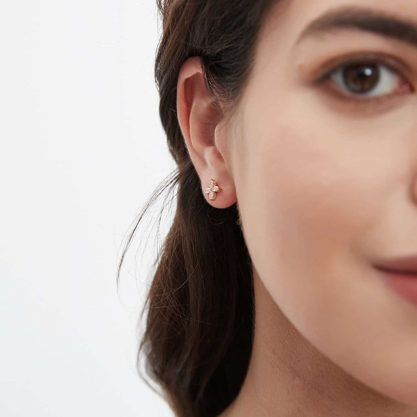 Side view of the pink diamond clover stud showing the 18K gold post