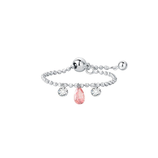 A high-resolution studio photograph of the Trio Diamond Pink Pear White Round Chain Ring from the LTM Jewels Radiant Drift collection. Handcrafted in 18K solid gold, the ring features a 0.13ct fancy pink pear diamond centerpiece flanked by two 0.08ct brilliant white round diamonds on a flexible chain band. The image highlights the high-polish AU750 gold finish and the exceptional fire of the 0.29ctw diamonds against a professional clean background.