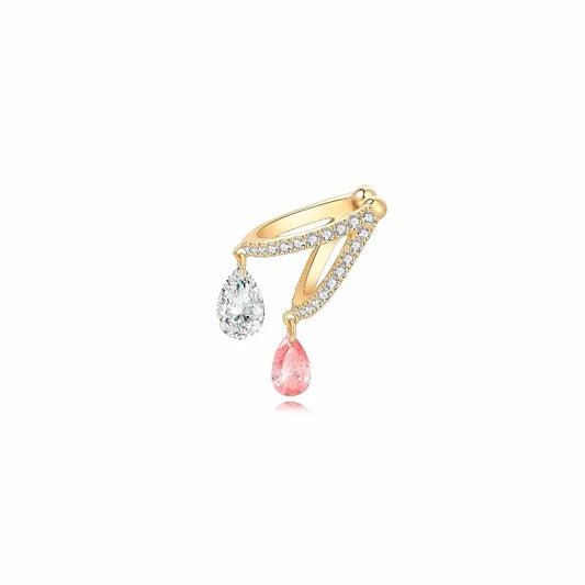 A high-resolution studio photograph of the Pink White Pear Pavé Dangle Ear Cuff from the LTM Jewels Radiant Drift collection. Handcrafted in 18K solid gold, this double-band cuff features a 0.15ct pink pear diamond and a 0.25ct white pear diamond dangle, accented by 0.2ctw of white diamond pavé. The image highlights the AU750 high-polish gold and the innovative no-piercing design against a clean background, showcasing its status as a sophisticated and cinematic wearable sculpture.