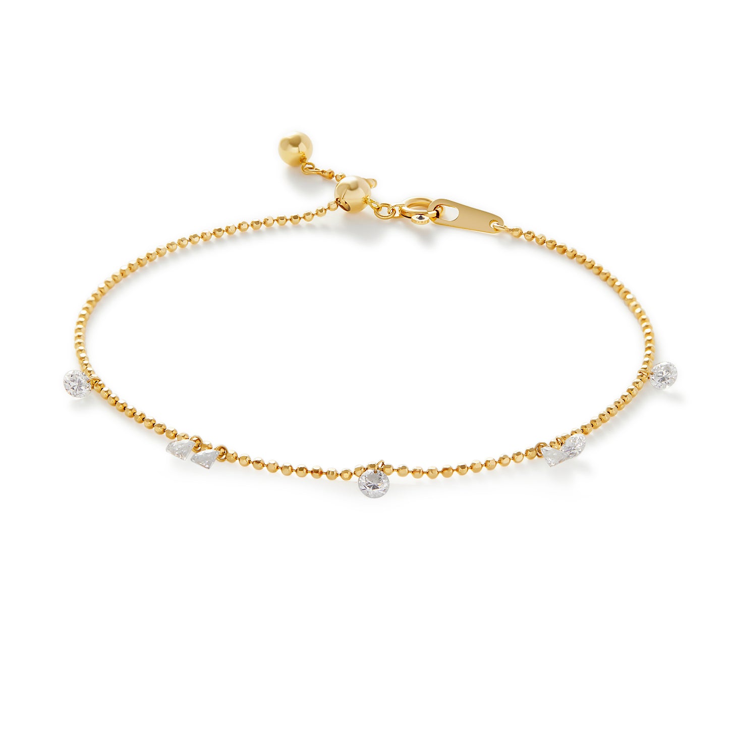 Seven Drilled Diamond Bracelet in 18K solid gold with floating diamonds.