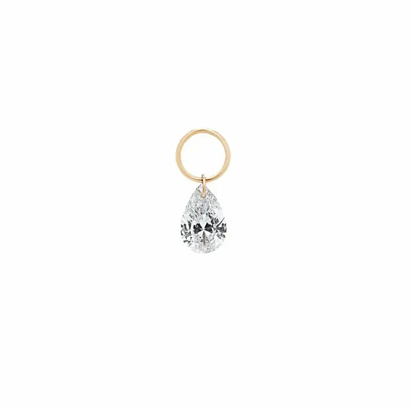 A single pear-cut lab-grown diamond charm for earrings, expertly laser-drilled for a unique floating effect in 18K solid gold. This minimalist jewelry piece by LTM Jewels showcases the brilliance of a VVS-VS clarity, D-E color diamond without a traditional setting. Perfect as a modular jewelry accessory for curated ear stacks, this 18K gold diamond dangle charm offers a weightless, sophisticated aesthetic for modern luxury lovers seeking ethical, sustainable fine jewelry.