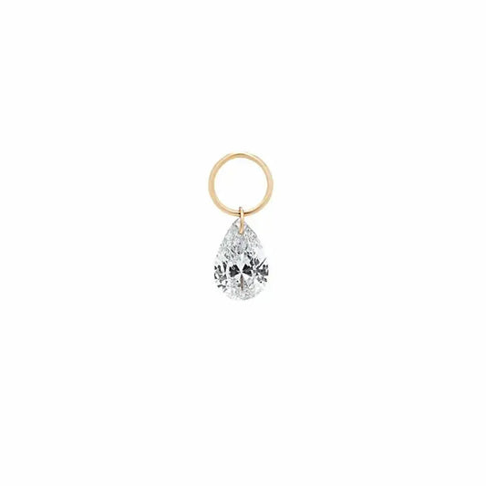 A single pear-cut lab-grown diamond charm for earrings, expertly laser-drilled for a unique floating effect in 18K solid gold. This minimalist jewelry piece by LTM Jewels showcases the brilliance of a VVS-VS clarity, D-E color diamond without a traditional setting. Perfect as a modular jewelry accessory for curated ear stacks, this 18K gold diamond dangle charm offers a weightless, sophisticated aesthetic for modern luxury lovers seeking ethical, sustainable fine jewelry.