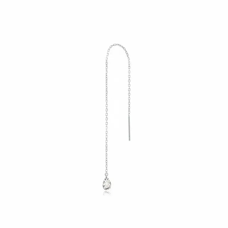 18K solid gold pear-cut diamond threader earring featuring a brilliant lab-grown white diamond suspended from a delicate high-polish gold chain. This minimalist fine jewelry piece by LTM Jewels showcases a sleek, setting-free aesthetic designed for fluid movement and rhythmic sparkle. Available in multiple carat sizes from 0.15ct to 0.5ct, this 18K gold threader is a versatile staple for modern ear stacks and sustainable luxury enthusiasts seeking VVS clarity and D-E color diamonds.
