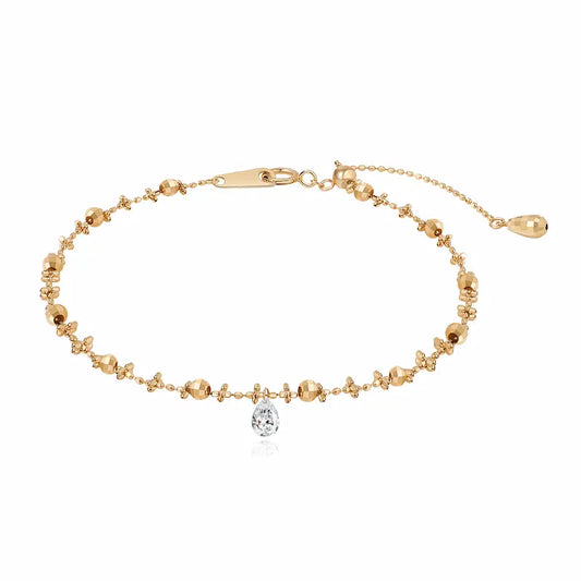 Floating Pear Diamond Bracelet handcrafted in 18K solid gold featuring a 0.15ct lab grown pear-cut diamond in a signature laser-drilled floating setting. Adjustable bead chain bracelet with a minimalist, elegant silhouette designed for everyday luxury, stacking, and timeless fine jewelry styling.