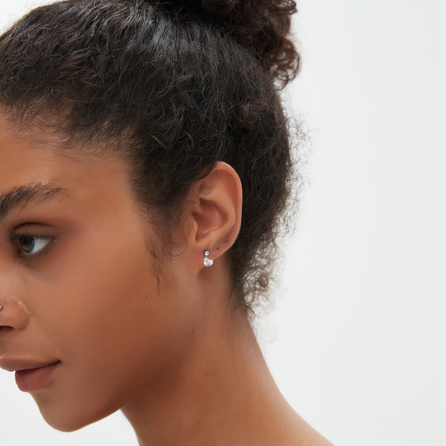 Threaded screw back of heart-cut diamond stud earring